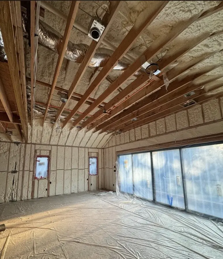 Interior walls and ceiling insulated with spray foam during new construction in Beaver Falls